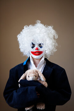 Scary evil clown boy