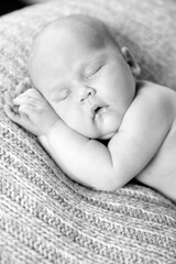 black white. sleeping newborn baby. care of children. peaceful sleep of child.