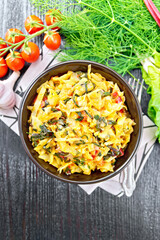 Cabbage stew with chard in bowl on board top