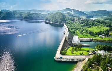 The Solina Dam aerial view, largest dam in Poland located on lake Solina. Hydroelectric power plant...