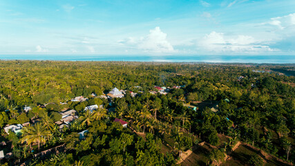 Aerial view of a small village between the trees in Bayan, Senaru, North Lombok