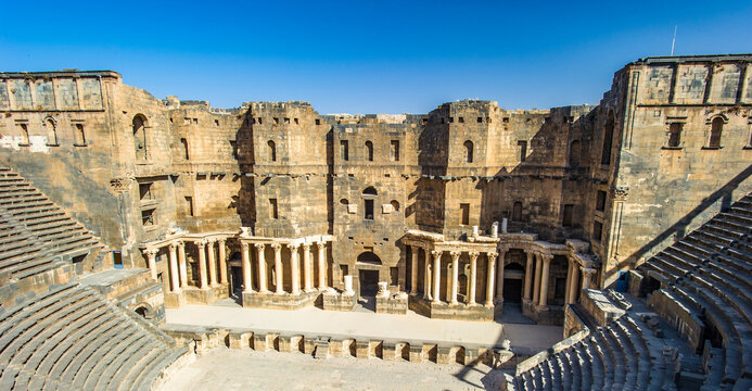 It's The 2nd century Roman theater, constructed probably under Trajan. Ancient City of Bosra, UNESCO World Heritage,