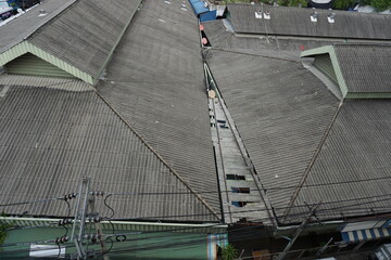 Naklejka premium looking at the roof of a house perspective from a tall building activity at home school supplies photography fragment of artwork graphic resources unique concept abstract expressionism elements art