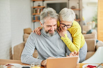 senior couple happy laptop computer love together elderly love man woman shopping - Powered by Adobe