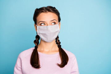 Close-up portrait of her she nice attractive minded girl wearing safety mask overthinking flu flue high fever grippe recovery solution isolated bright vivid shine vibrant blue teal color background
