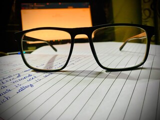 glasses and book