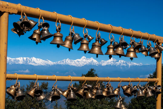 Nandadevi peak of Himalayas visible through temple bells in Uttarakhand.