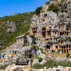 It's Ancient rock cut tombs of the Lycian necropolis, Myra, Turkey