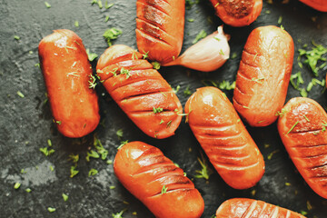 Delicious grilled sausages with garlic and parsley.