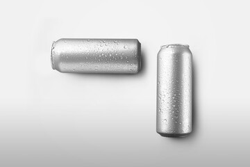 Set of big tin cans with lemonade or soda with condensate and drops, on a white background with shadows.