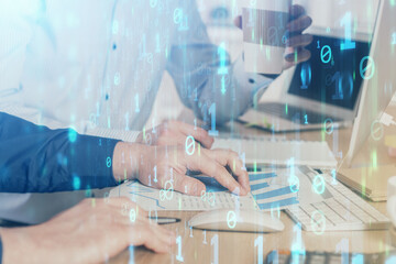 Double exposure of technology hologram with man working on computer background. Concept of big data.