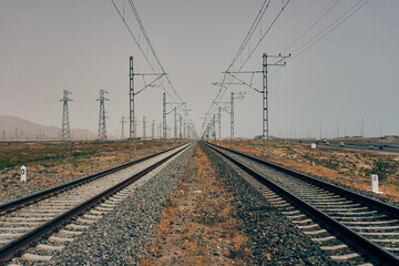 Fototapeta na wymiar Infinite looking railway tracks outside Baku.