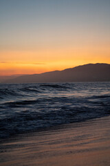 la-palms-beach-sunset-cloudy-waves-pier