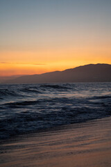 Fototapeta premium la-palms-beach-sunset-cloudy-waves-pier