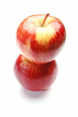 Stacked Apples on white background .