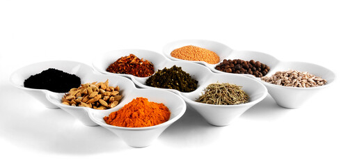 spices in white plates on white background