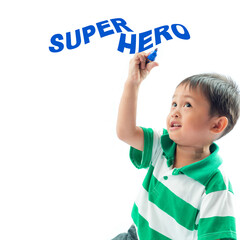 The cute boy wrote the word "SUPER HERO"