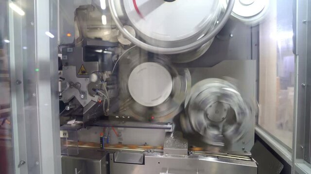 candy wrapper. industrial packing line on factory. automation of production.