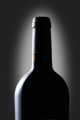 red wine bottle isolated on dark background with clipping path include and copy space for your text