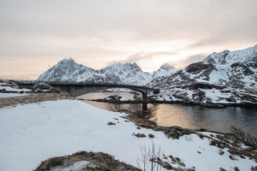Fototapeta premium A mountain bridge at sunset in the Lofoten islands. 