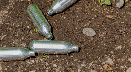 Empty Nitrous Oxide cartridges after used for drugs / human consumption