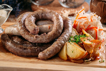 Homemade grilled beef sausage sauerkraut potatoes