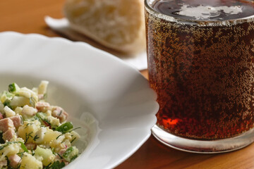 Vegetable salad with sausage
