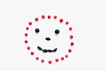 berry face on white background