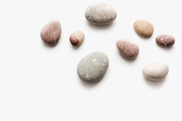Fototapeta na wymiar sea stones on white background