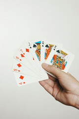 Hand with Cards on white background