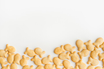biscuit cracker on white background, fish shaped cookies