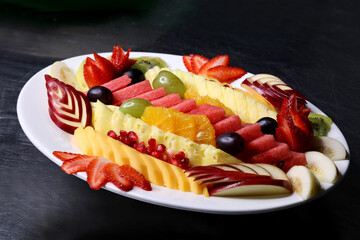 professional photography of mixed fruits salad served on table