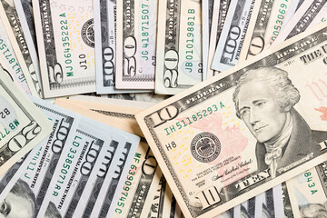 10 dollar bill on various US Dollar billss Top view of business concept on background with copy space