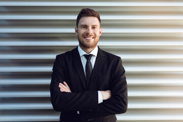 Businessman Hands Crossed Smilling on Grey Background. Business man Smilling on Sun