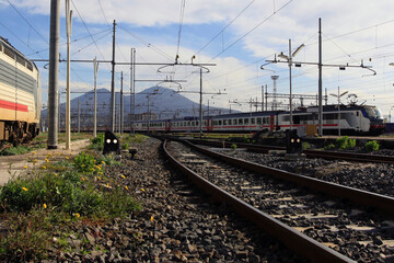 train on railway with Vesuvius on the background