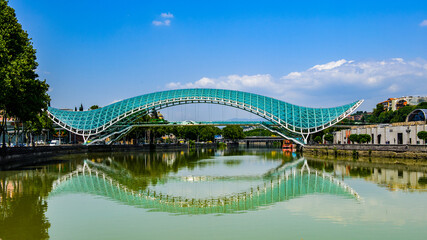 It's Bridge of Peace in Tbilisi, Geaorgia, bow-shaped pedestrian bridge over the Kura River in Tbilisi, capital of Georgia. One of the most important sites of Tbilisi