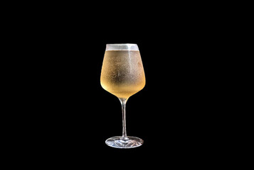 glass of cold wine on black background