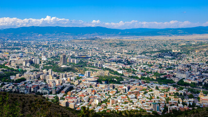 Fototapeta na wymiar It's Panoramic view of Tbilisi, Georgia. Tbilisi is the capital and the largest city of Geogia with 1,5 mln people population