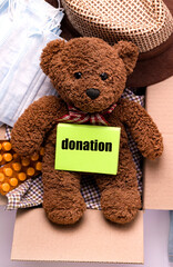 Concept donation of volunteers of things and toys with medicines