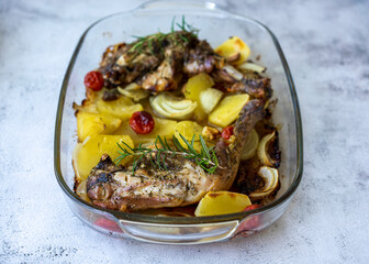 Organic chicken drumstick with baked potatoes