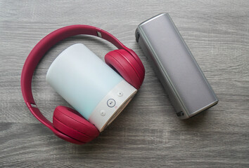 close up cute pink wireless headphone with bluetooth speaker lighting function for music connections