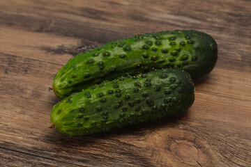 Ripe fresh green two cucumbers
