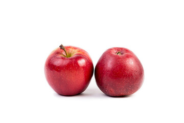 two red apples on a white background