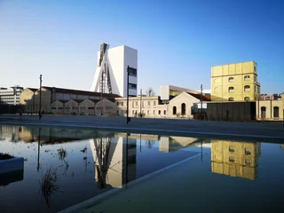 Fototapete Milaan Milan, Italy February 17th 2019 Fondazione Prada with reflective pool, photographed from Adriano Olivetti's square
