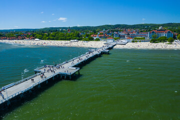Fototapeta na wymiar Sopot Aerial View. Beautiful architecture of Sopot resort from above. Wooden pier (molo) and Gulf of Gdansk. Sopot is major tourist destination in Poland.