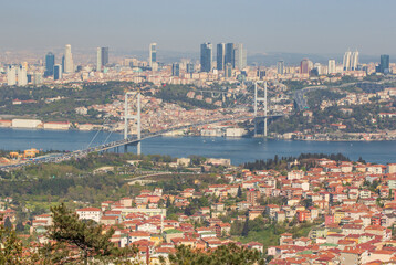 Fototapeta premium Istanbul, Turkey - completed in 1988 and one of the main landmarks in Istanbul, the Fatih Sultan Mehmet Bridge connects Europe and Asia. Here in particular the suspension bridge structure