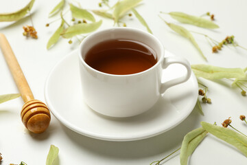 Composition with linden tea on white background, close up. Natural tea