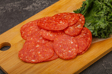 Italian spycy pepperoni sausage slices