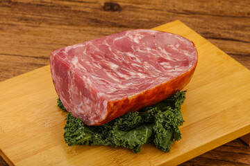 Beef ham piece over board