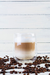 Cup of coffee macchiato. Hot drink coffee on white background